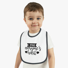 Load image into Gallery viewer, I stole everyone's heart Baby Contrast Trim Jersey Bib
