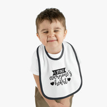 Load image into Gallery viewer, I stole everyone&#39;s heart Baby Contrast Trim Jersey Bib
